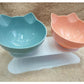 Elevated tilted cat bowl for food and water