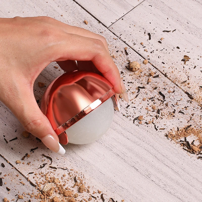 Compact lint and pet hair remover ball