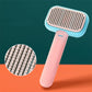 Pet grooming brush with easy grip handle