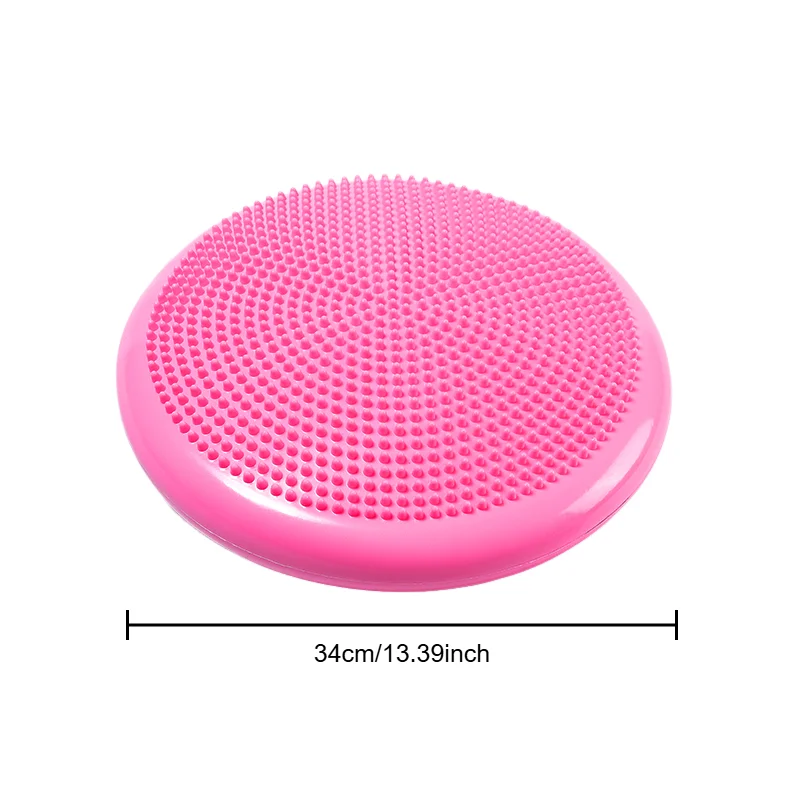 Pink inflatable balance cushion for yoga workout