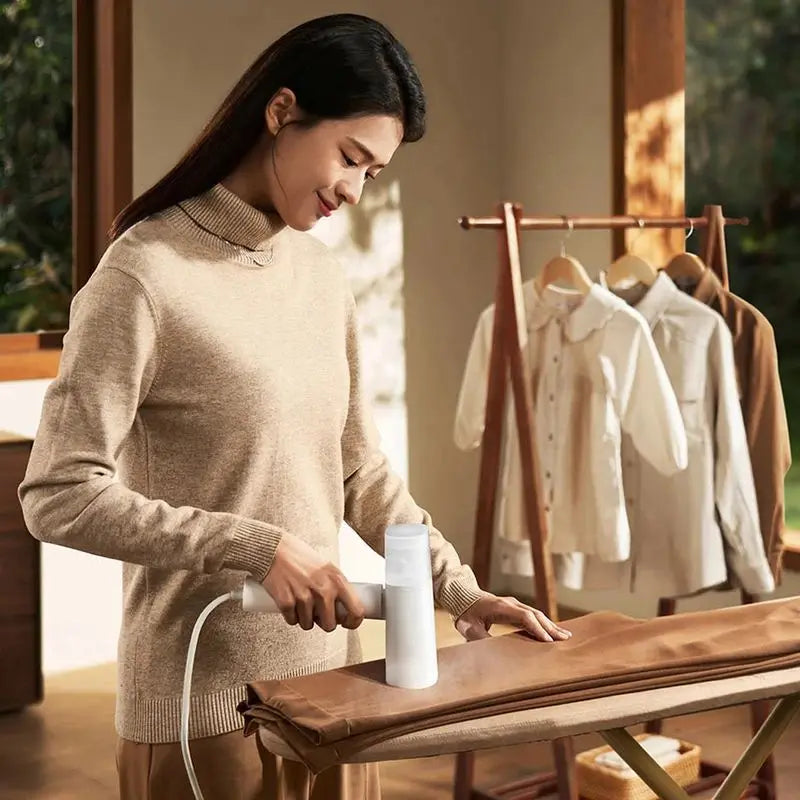 Portable handheld garment steamer for clothes and home fabric steam cleaning
