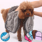 Quick drying pet towel being wrung out after absorbing water