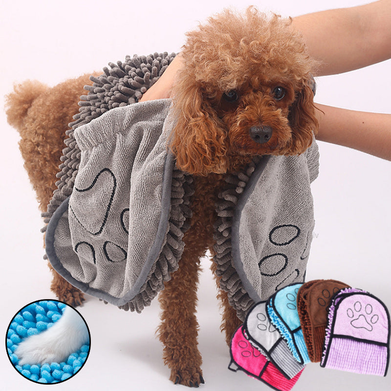 Quick drying pet towel being wrung out after absorbing water