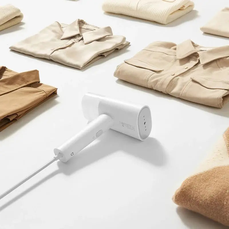 Portable handheld garment steamer for clothes and home fabric steam cleaning