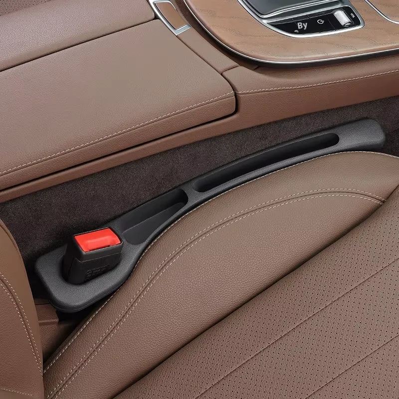 Car seat gap plug storage box and leak resistant strip for car interior